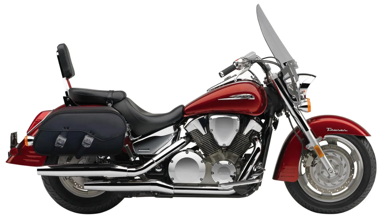 1208- HONDA VTX 1300T saddlebags by saddleline with complete quick detachable mounting hardware (included).